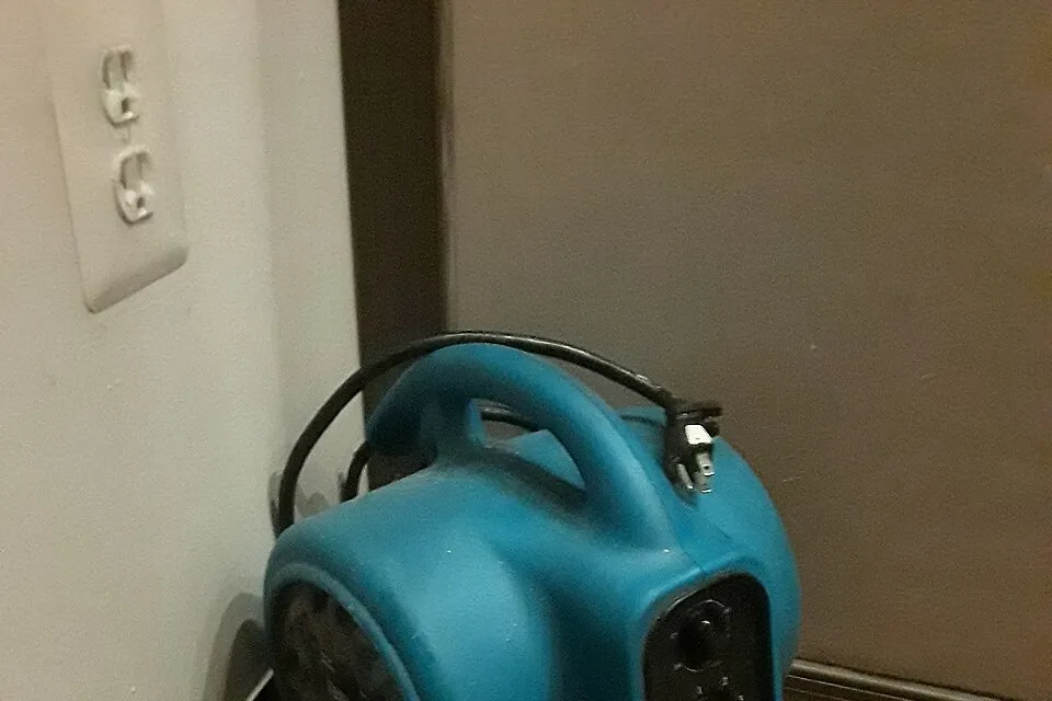 Portable air-moving equipment used in drying work